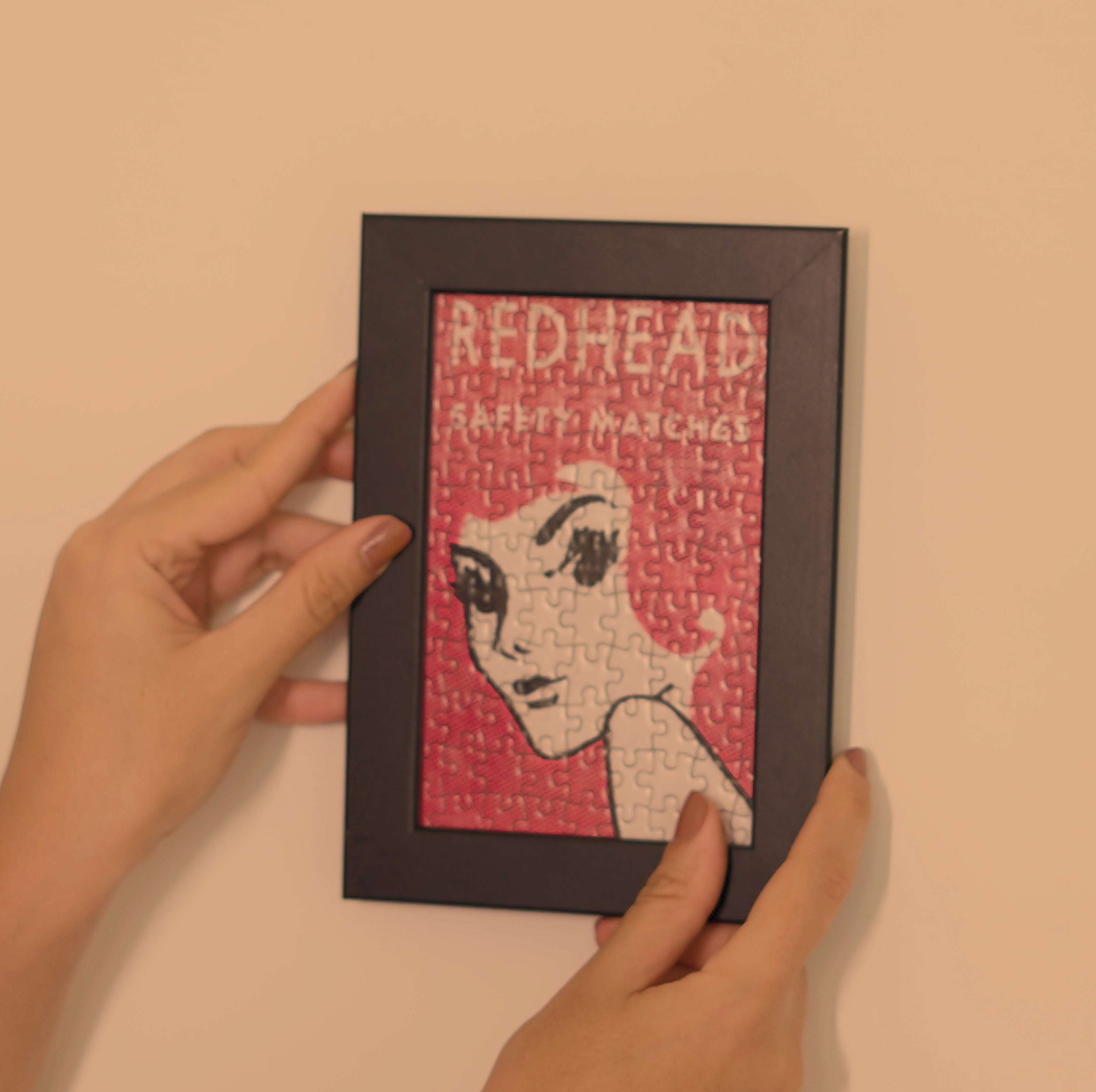 Framed puzzle artwork